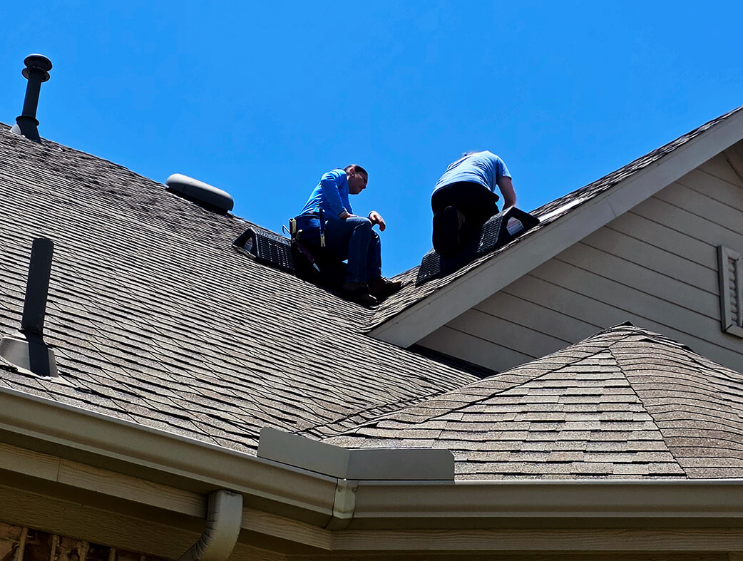 1080x600 roofers working on a roof in Southlake